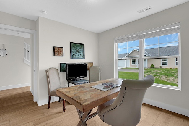 110 Cumberland Meadows Cir, Hebron, OH 43025 - dining space featuring light wood-style flooring, baseboards, and a desk