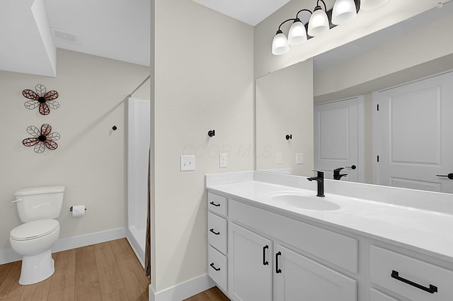 110 Cumberland Meadows Cir, Hebron, OH 43025 - full bath with vanity, wood finished floors, toilet, a shower with shower curtain, and baseboards