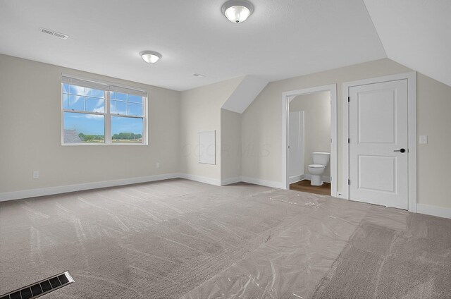 110 Cumberland Meadows Cir, Hebron, OH 43025 - bonus room featuring carpet, baseboards, and lofted ceiling