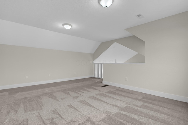 110 Cumberland Meadows Cir, Hebron, OH 43025 - additional living space featuring carpet flooring, lofted ceiling, and baseboards