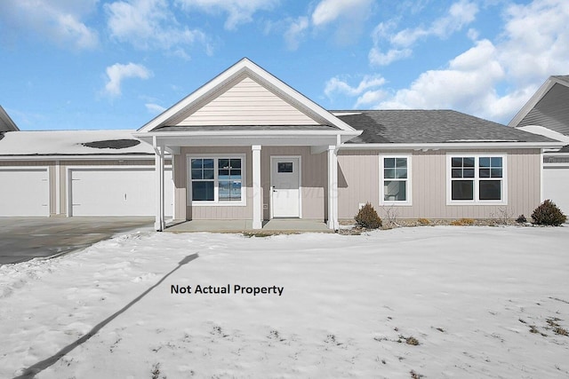 view of front of property with a garage