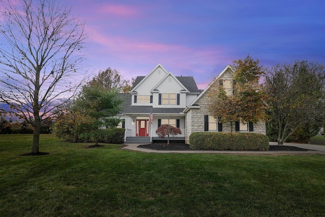 view of front facade with a lawn