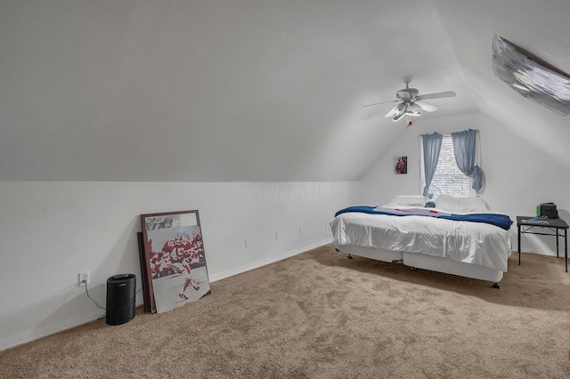 bedroom featuring carpet floors, ceiling fan, and lofted ceiling