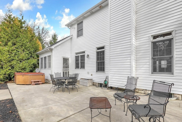 view of patio / terrace featuring a hot tub