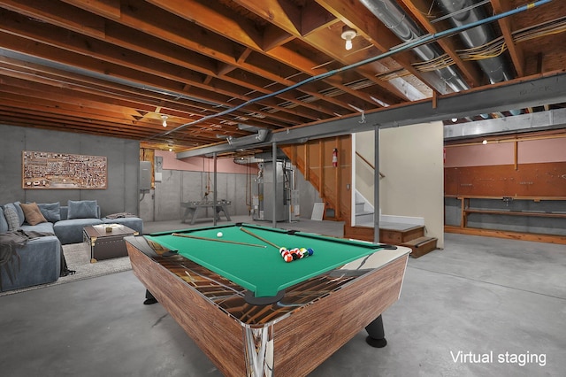 recreation room featuring concrete flooring, heating unit, and pool table