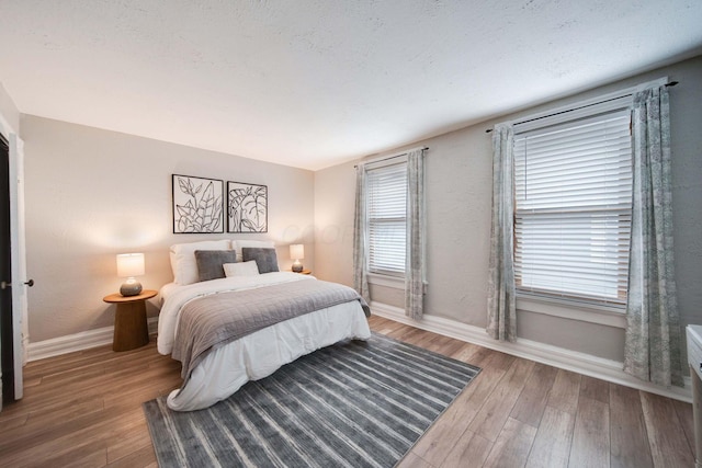 bedroom featuring hardwood / wood-style flooring