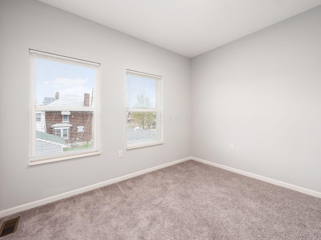 view of carpeted spare room