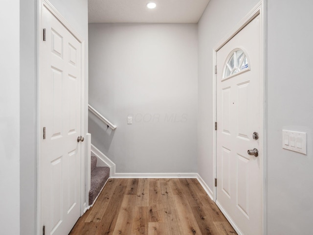 doorway to outside with light hardwood / wood-style flooring