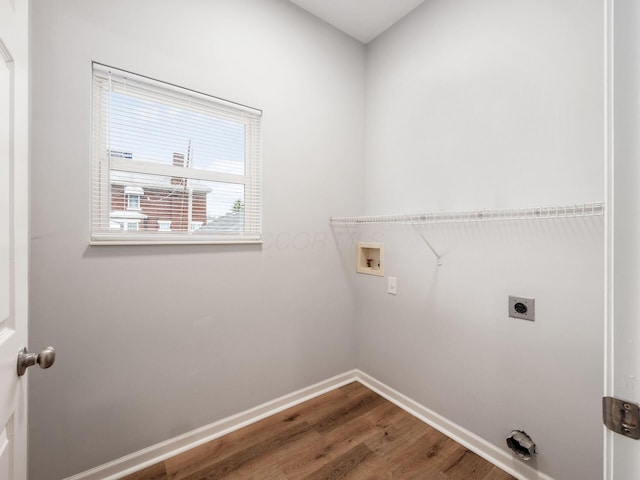 laundry area with hardwood / wood-style floors, electric dryer hookup, and washer hookup