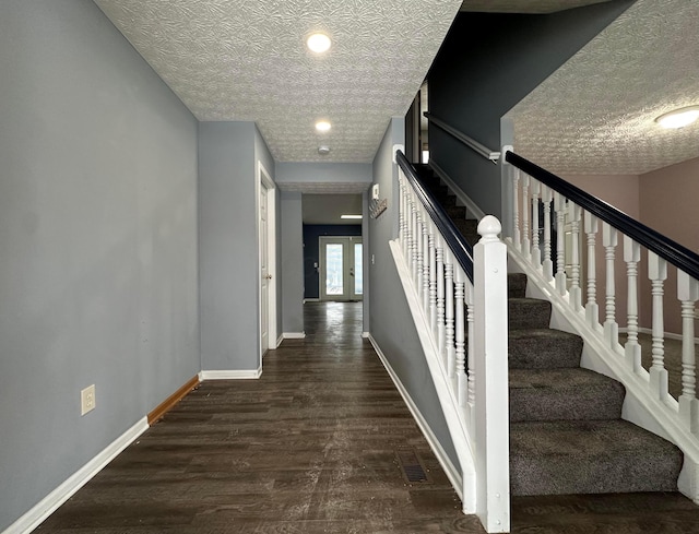 stairs with wood-type flooring