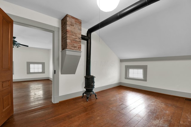 additional living space featuring lofted ceiling, ceiling fan, and wood-type flooring