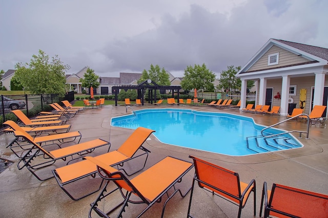 view of swimming pool featuring a patio