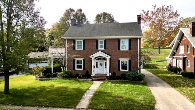 colonial-style house with a front lawn