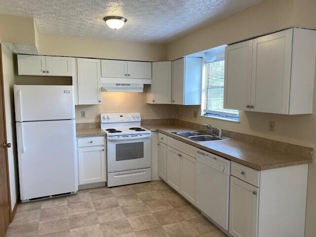 kitchen featuring sink, ventilation hood, a textured ceiling, white appliances, and white cabinets