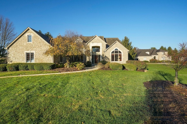 view of front of home with a front yard