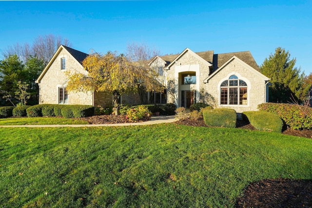 view of front of house with a front lawn