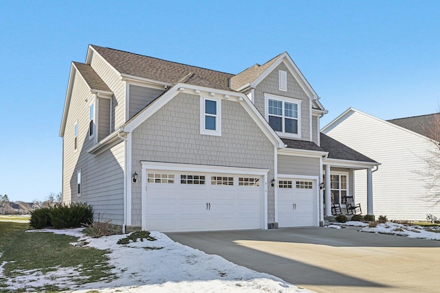 view of front of property featuring a garage