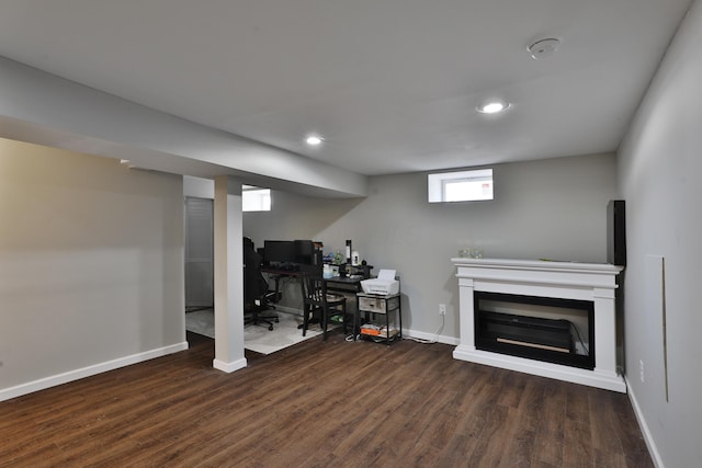 basement with dark wood-type flooring