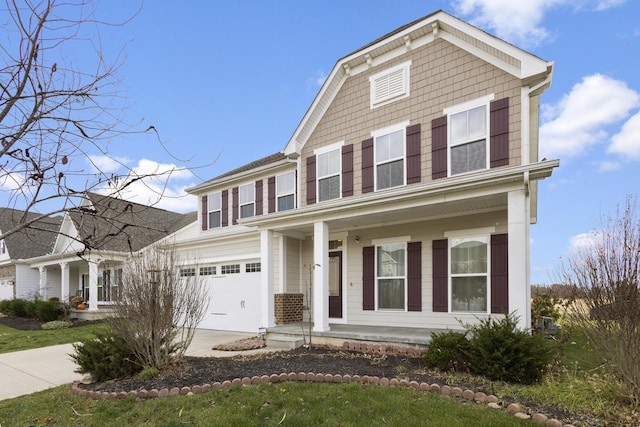 view of front of house featuring a porch and a garage