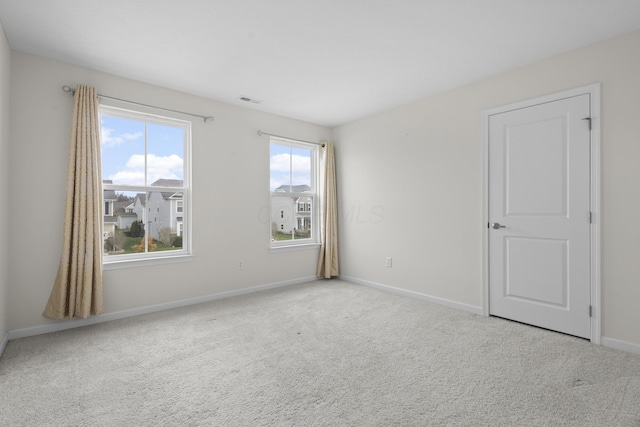 view of carpeted spare room