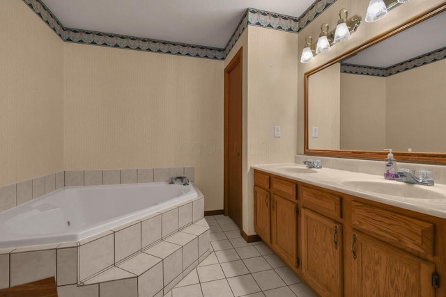 bathroom with tile patterned flooring, double vanity, a bath, and a sink