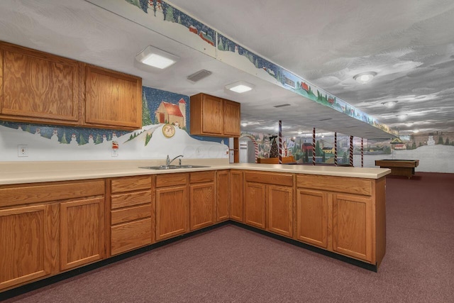 kitchen with dark colored carpet, sink, kitchen peninsula, and billiards