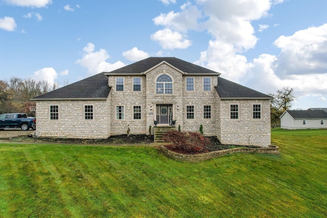 view of front of house with a front lawn