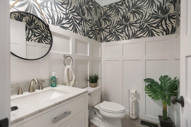 bathroom with vanity and toilet