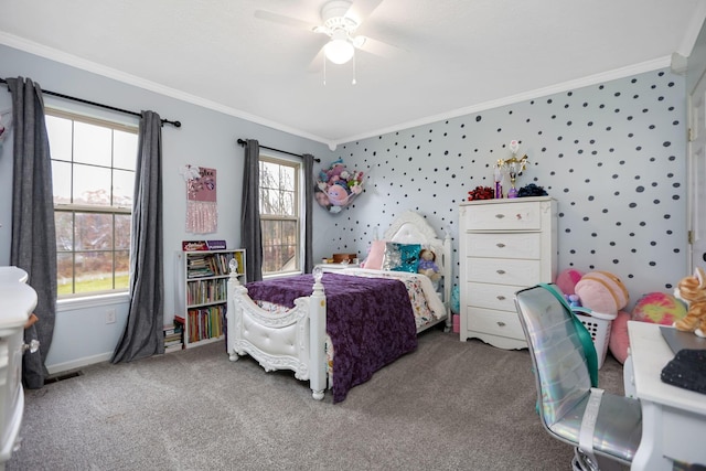 carpeted bedroom with ceiling fan and crown molding