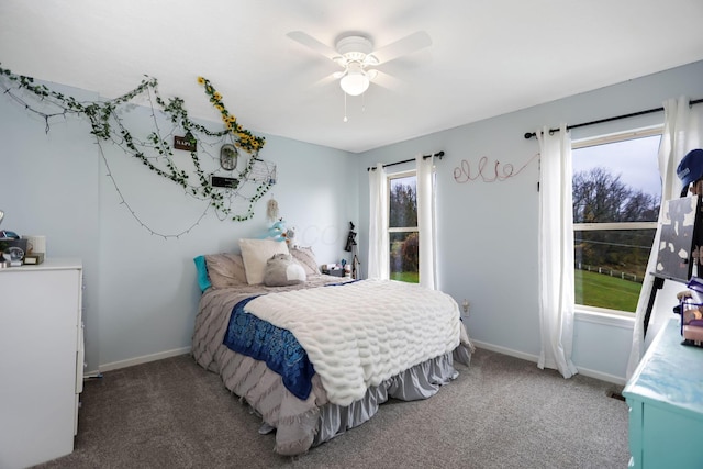 bedroom with ceiling fan and carpet