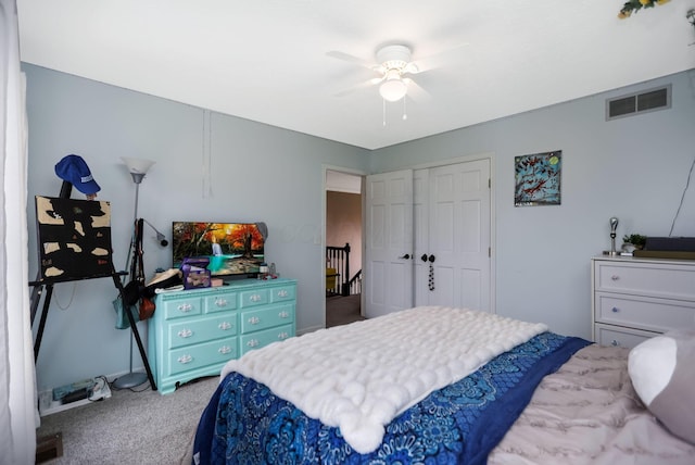 bedroom with carpet, a closet, and ceiling fan