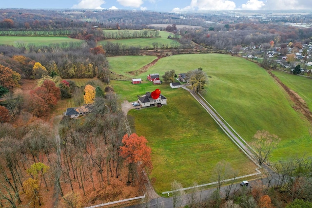 birds eye view of property featuring a rural view