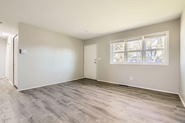 empty room featuring light wood-type flooring