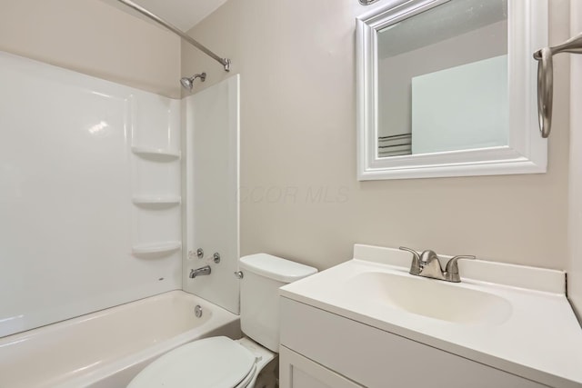 full bathroom featuring vanity,  shower combination, and toilet