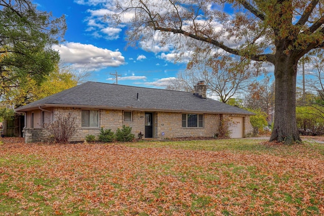 back of house with a garage