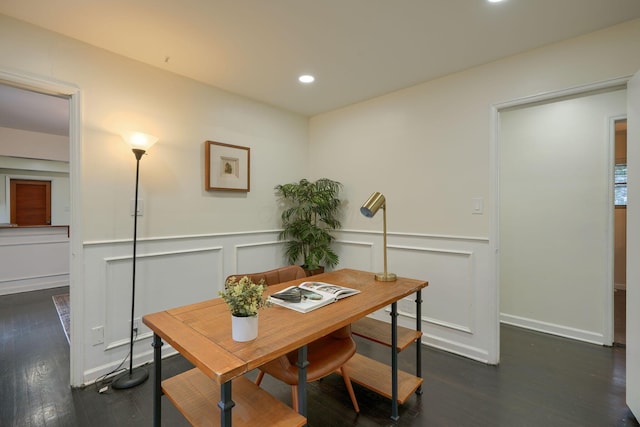 office space with dark hardwood / wood-style flooring