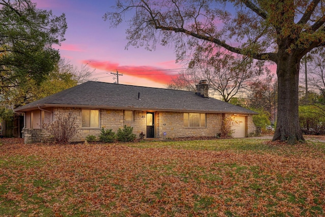 single story home with a garage