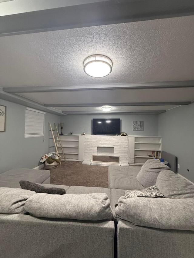 living room with carpet and a textured ceiling