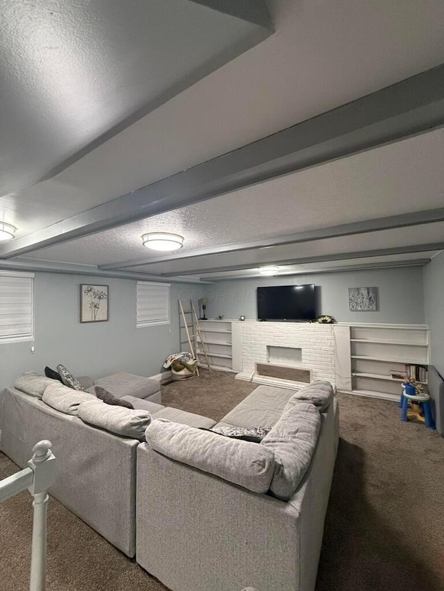 carpeted living room featuring a textured ceiling