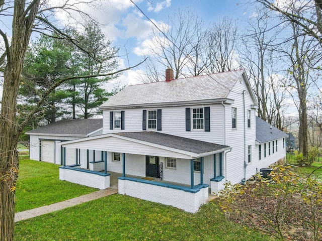 view of front facade featuring a front yard, a porch, and central air condition unit