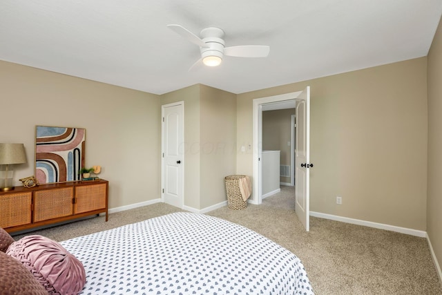 bedroom featuring ceiling fan and light colored carpet