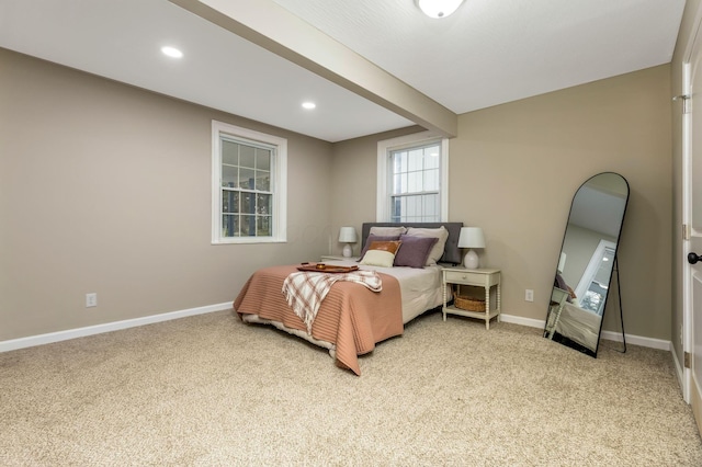 bedroom with light carpet