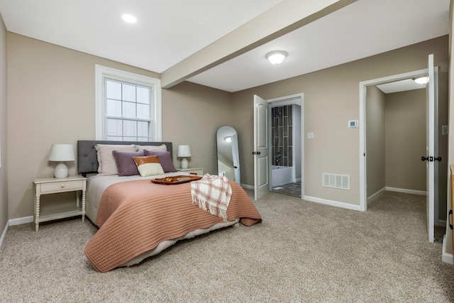 bedroom featuring light carpet