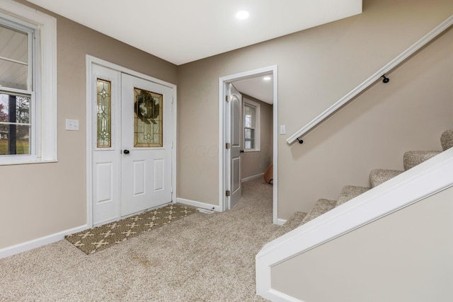 foyer with carpet