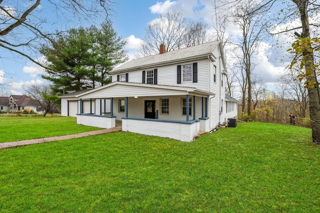 view of front of home with a front lawn, cooling unit, covered porch, and a garage