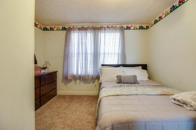 carpeted bedroom with a textured ceiling