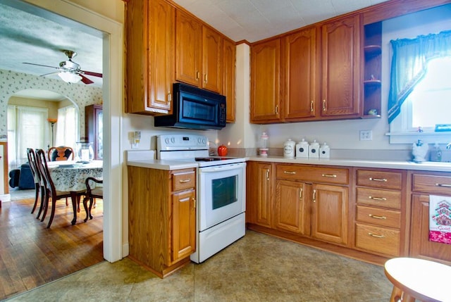 kitchen with electric range, light hardwood / wood-style flooring, and ceiling fan