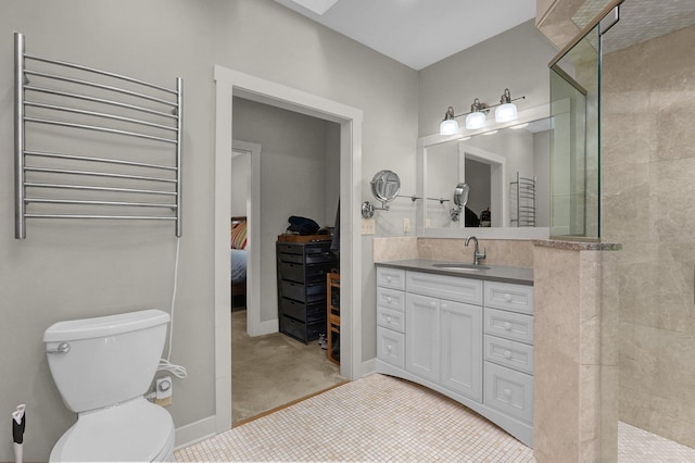 bathroom with toilet, a shower, radiator heating unit, vanity, and tile patterned flooring