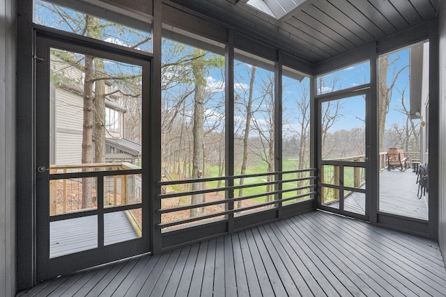 unfurnished sunroom with a wealth of natural light