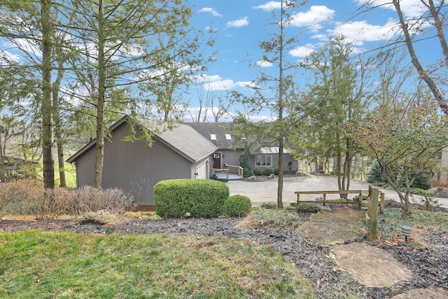 view of property exterior featuring a patio